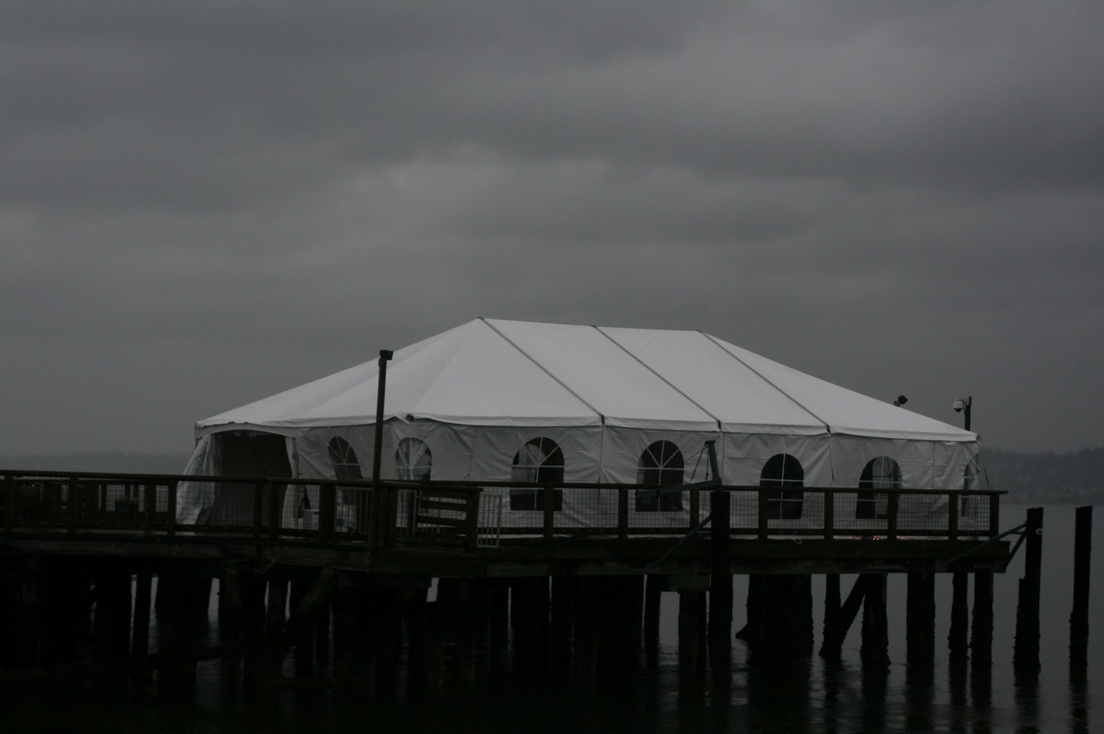 A white tent on a dock