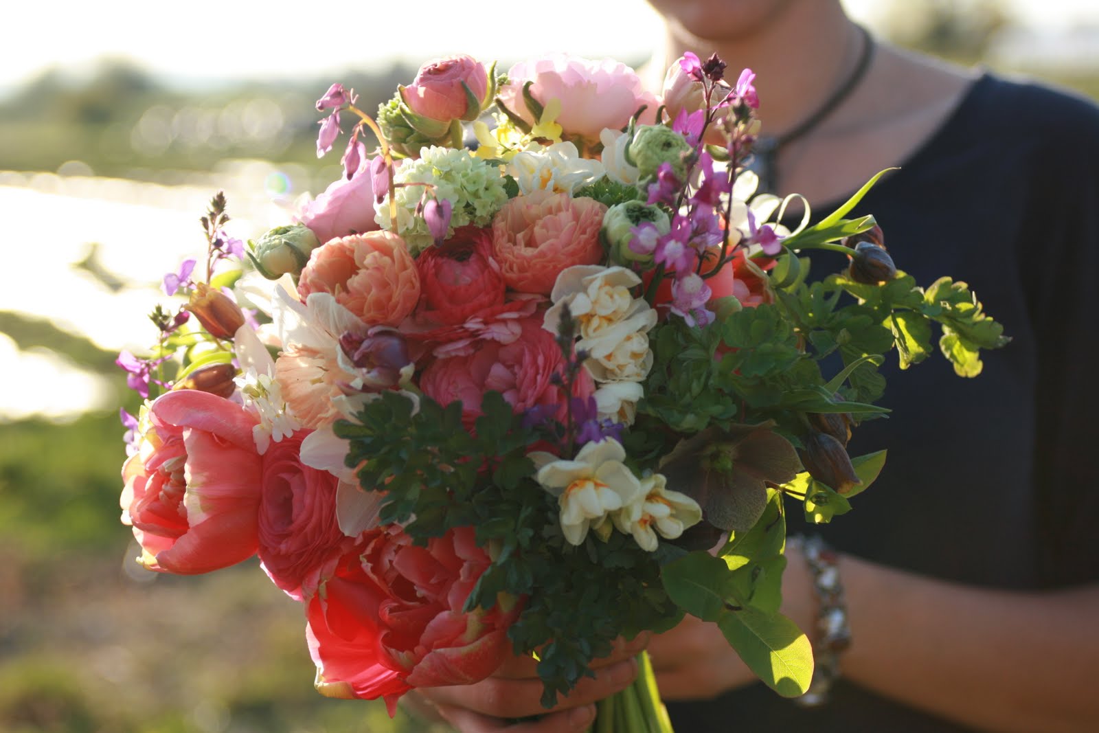 Erin Benzakein with a bouquet of flowers