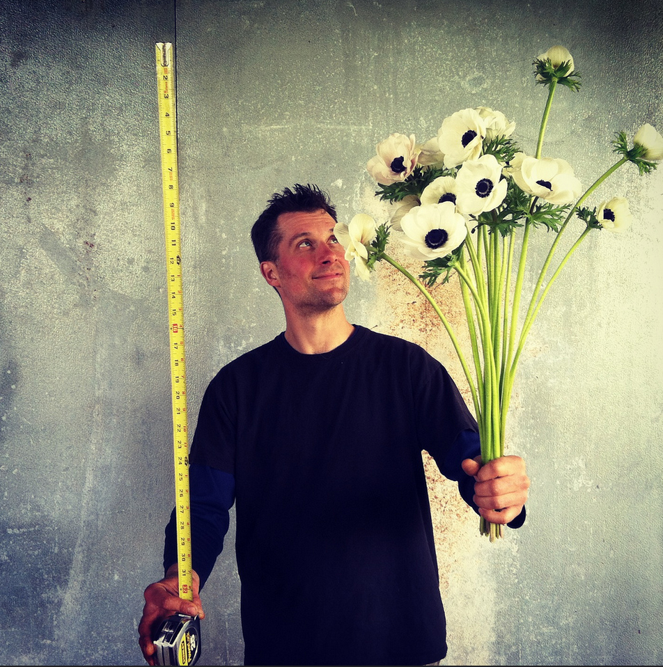 Chris Benzakein measuring anemone stems
