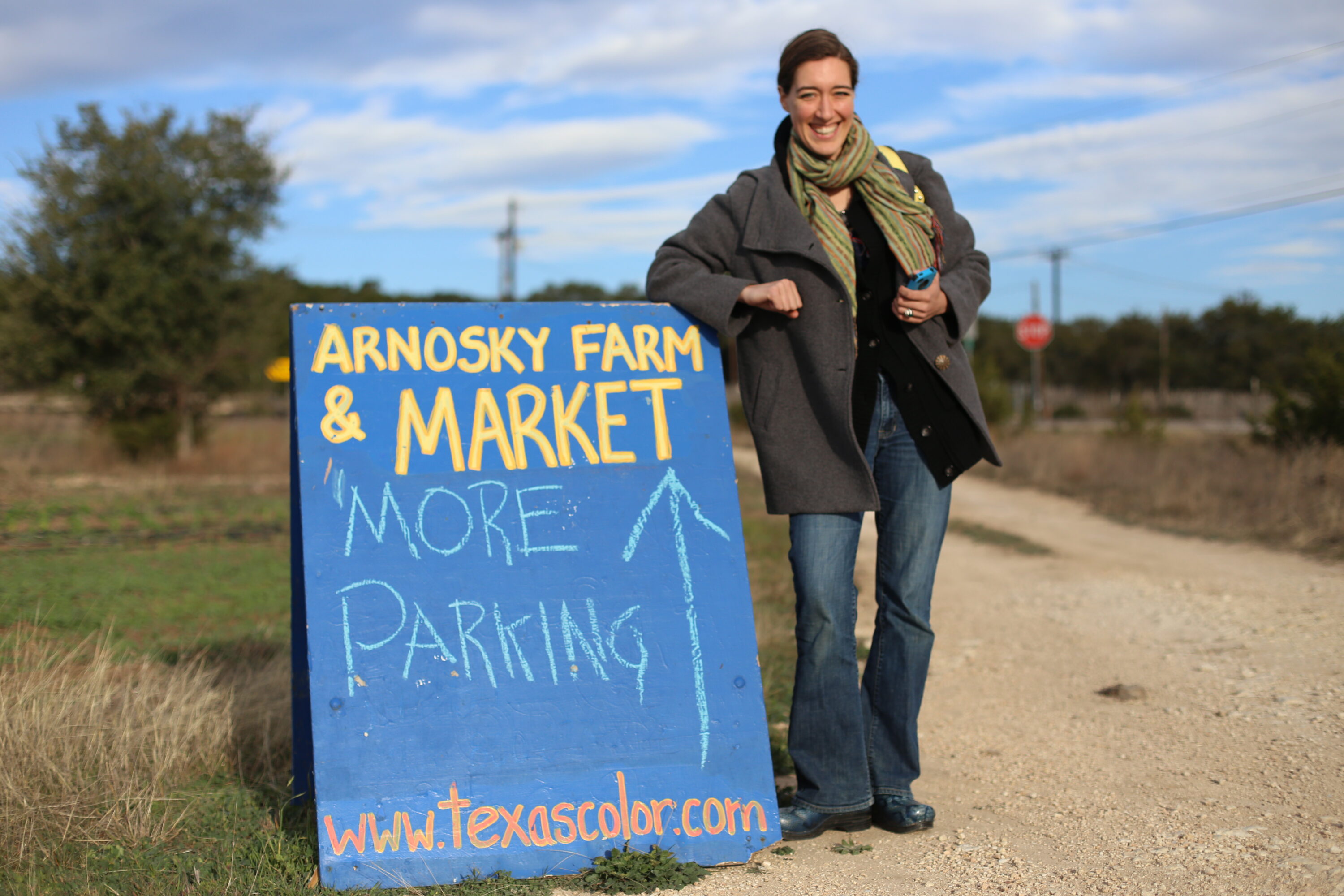 Erin Benzakein with Texas Specialty Cut Flowers sign