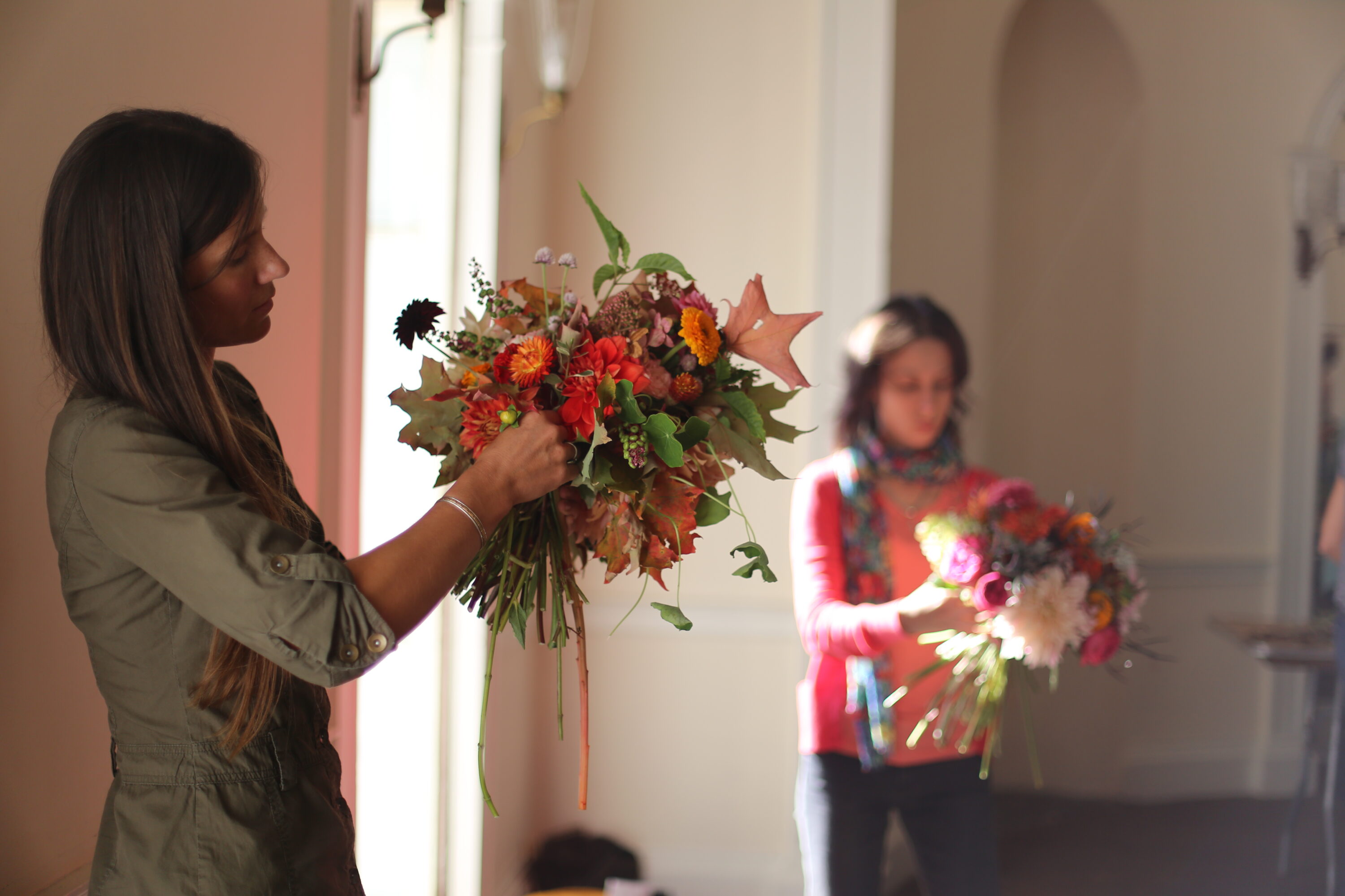 Women arranging flowers