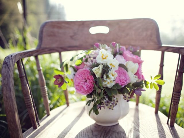 A bouquet of flowers on a chair