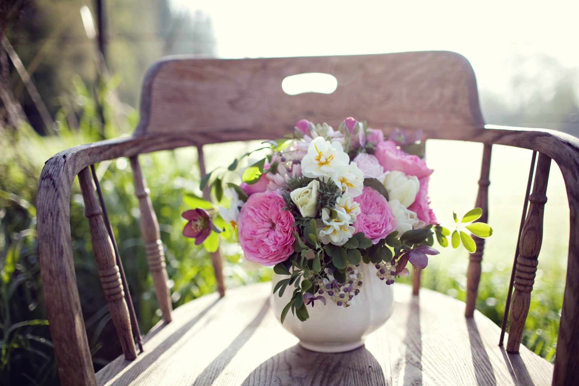 A bouquet of flowers on a chair