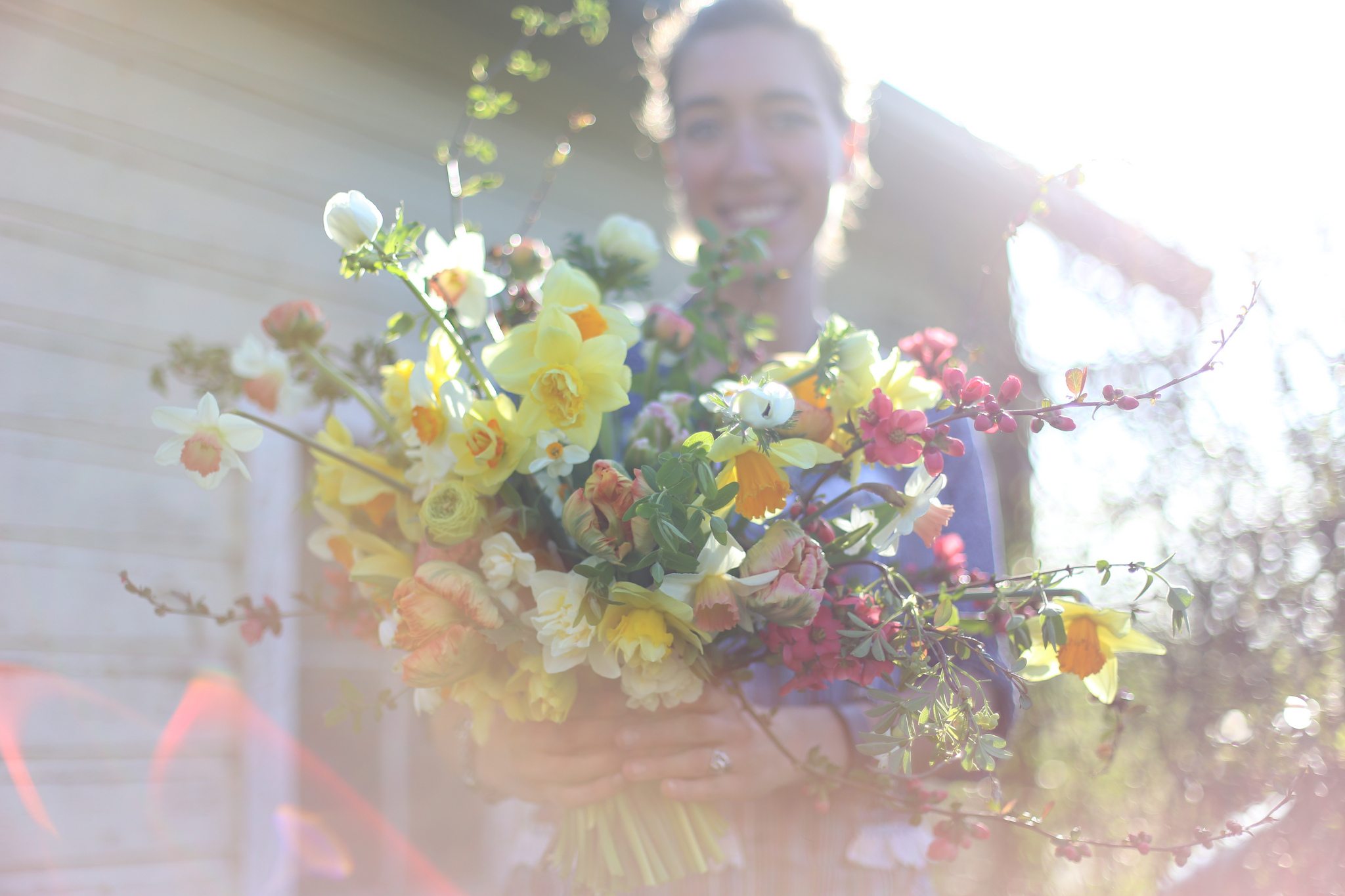 Erin Benzakein holding a bouquet