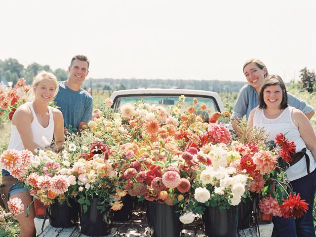 Team Floret standing around a truck full of flowers