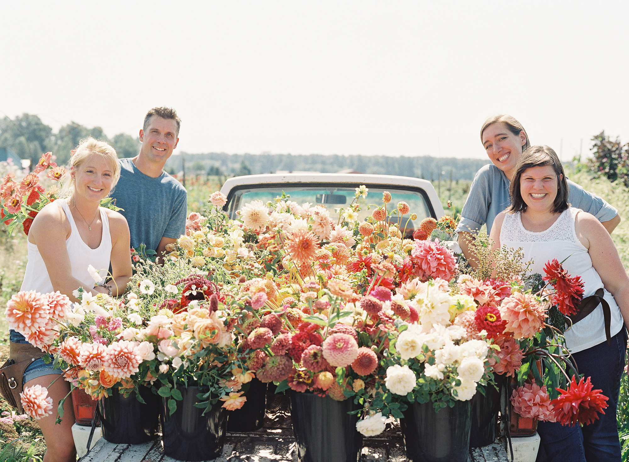 Team Floret standing around a truck full of flowers