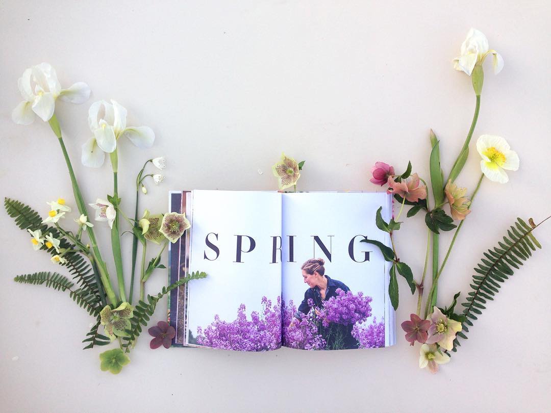 Floret book surrounded by flowers