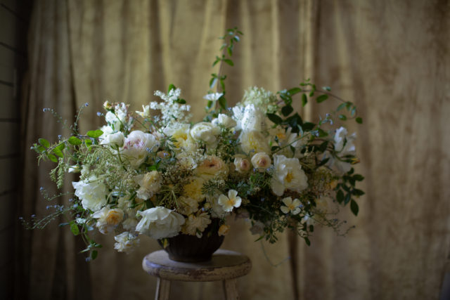 Floral arrangement featuring California Poppies designed by Floret 