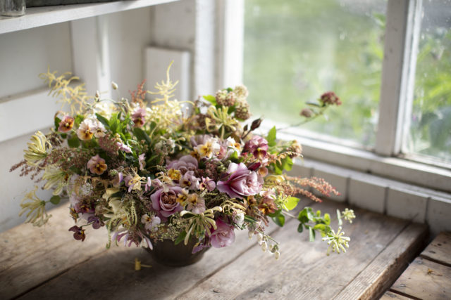 Spring bouquet featuring the first roses