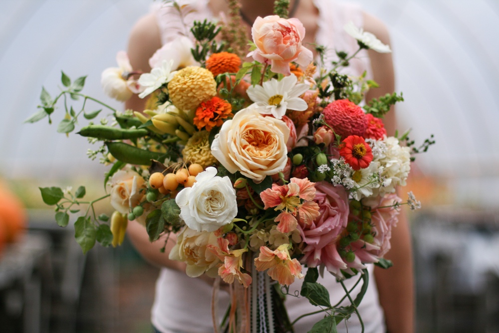 Erin Benzakein holding a bouquet of edible flowers