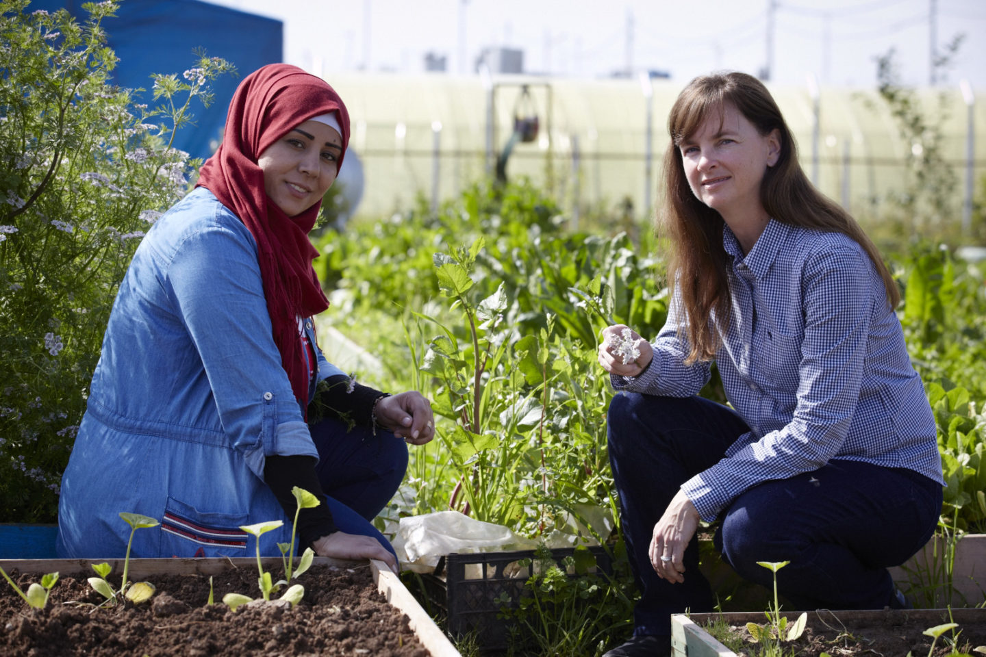 Two women in community garden