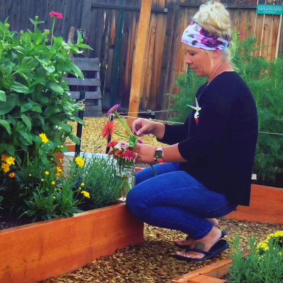 Emily Campbell working in her garden