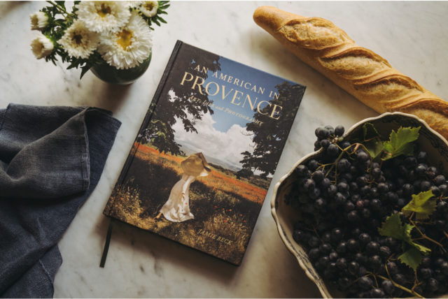 An American in Provence book with fruit and flowers surrounding it