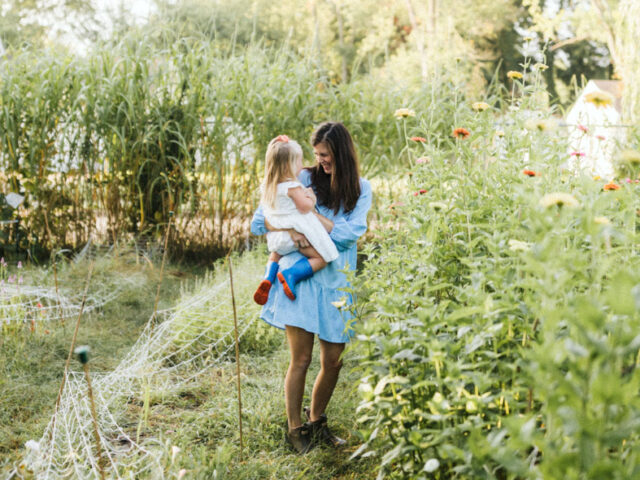 Danielle Grandholm in the garden with her daughter