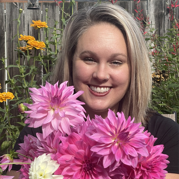 Courtney Small with a handful of dahlias