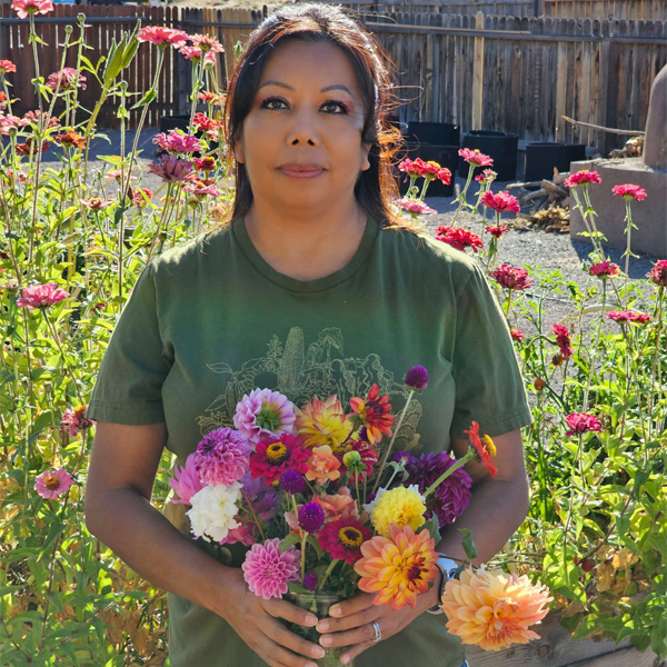 Leanna Jojola with a handful of blooms