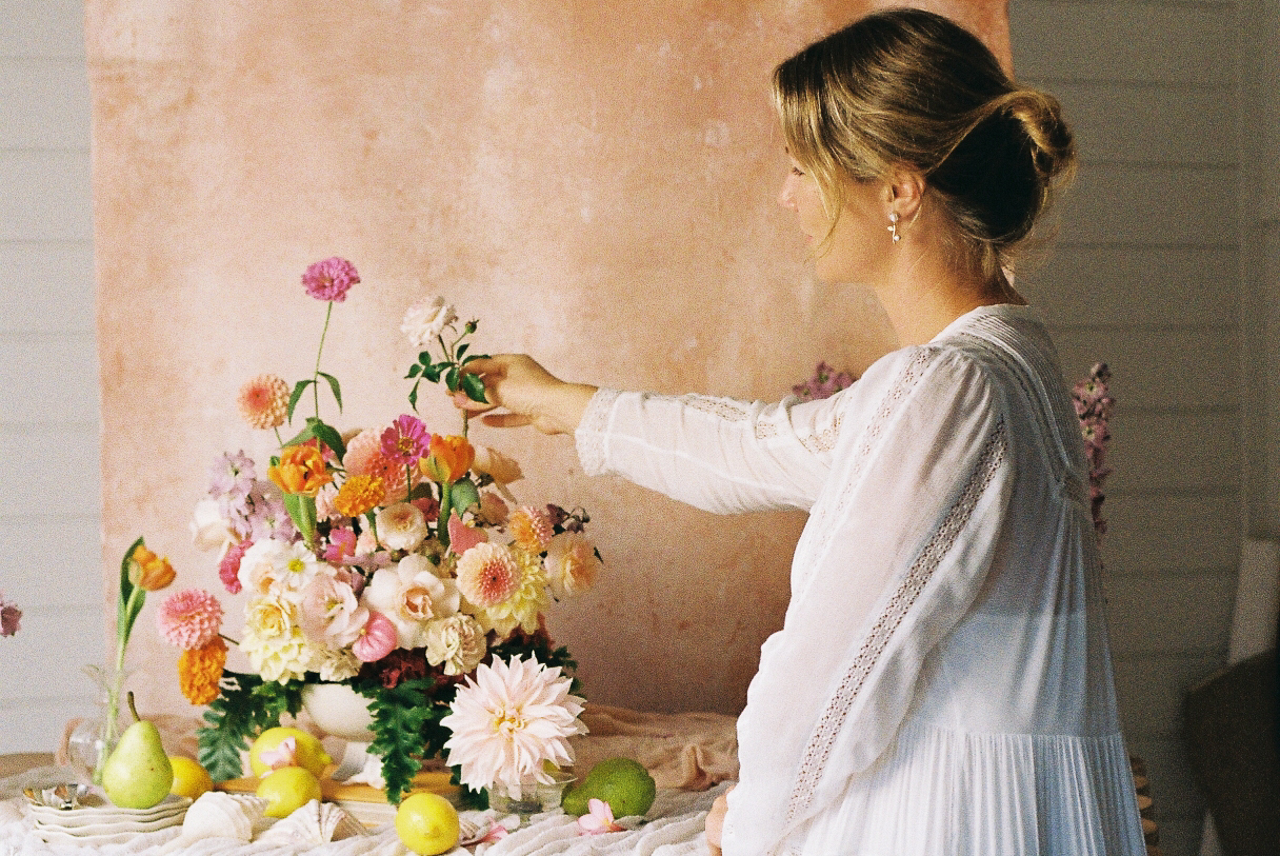 Tanya Barbariol creating a floral arrangement