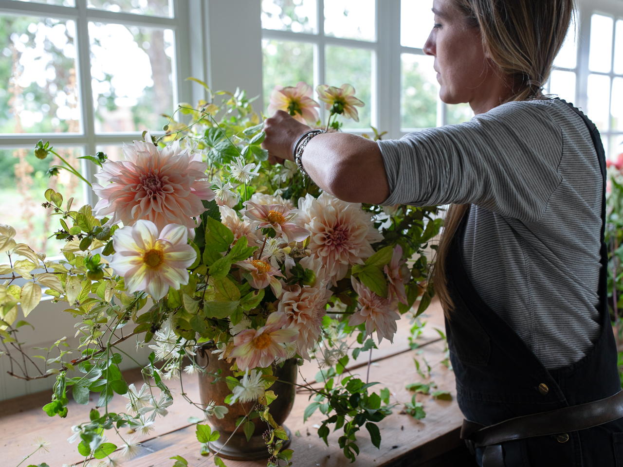 Erin Benzakein creating a seasonal floral arrangement