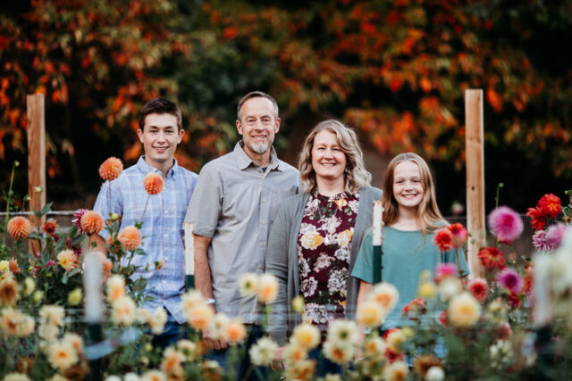 The Debrie family in the dahlia patch at Tree House Blooms.