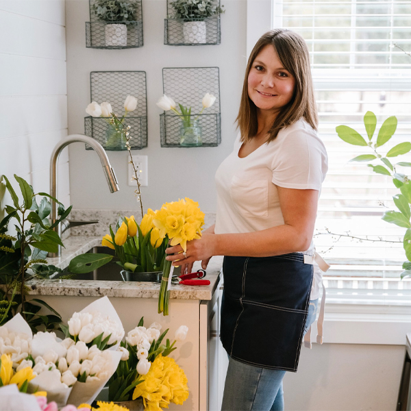 Zhanna Andreyanov arranging flowers